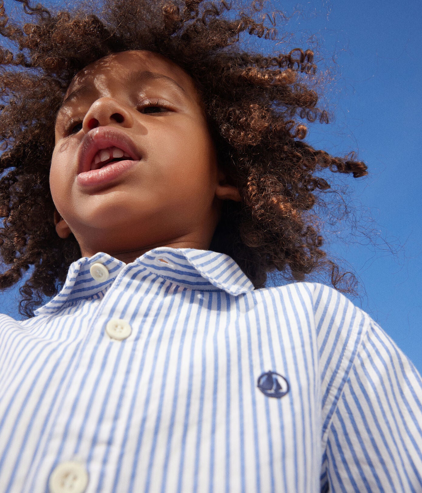 boys blue and white striped shirt